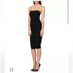 Nookie Allegra chain strap cocktail dress with ruched design on sides.
